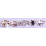 A COLLECTION OF FIVE DRESS RINGS including gold rings. (5)