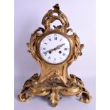 A LARGE 19TH CENTURY FRENCH ORMOLU SCROLLING MANTEL CLOCK by Tiffany & Co, of elegant flowing form.