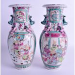 A PAIR OF EARLY 20TH CENTURY CHINESE FAMILLE ROSE VASES Guangxu. 25.5 cm high.