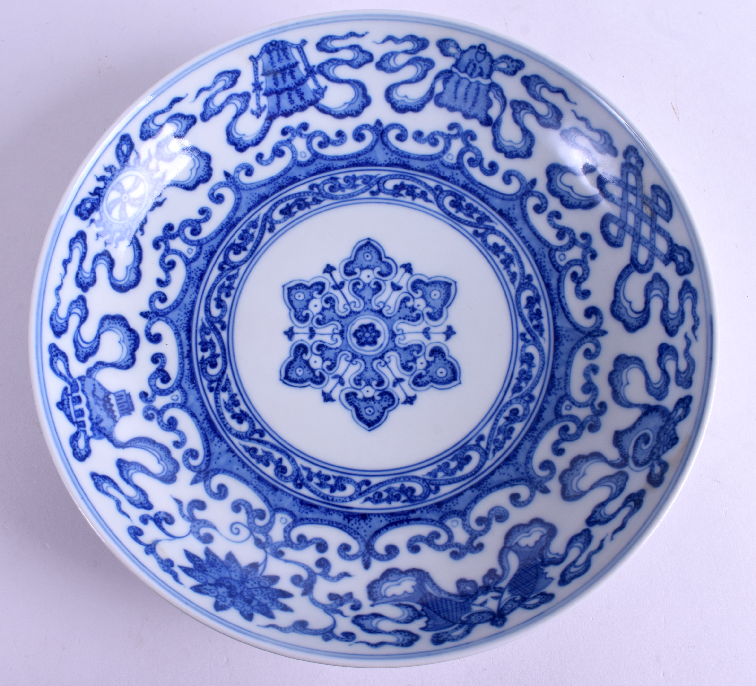 A CHINESE BLUE AND WHITE SAUCER DISH bearing Yongzheng marks to base. 21 cm wide.