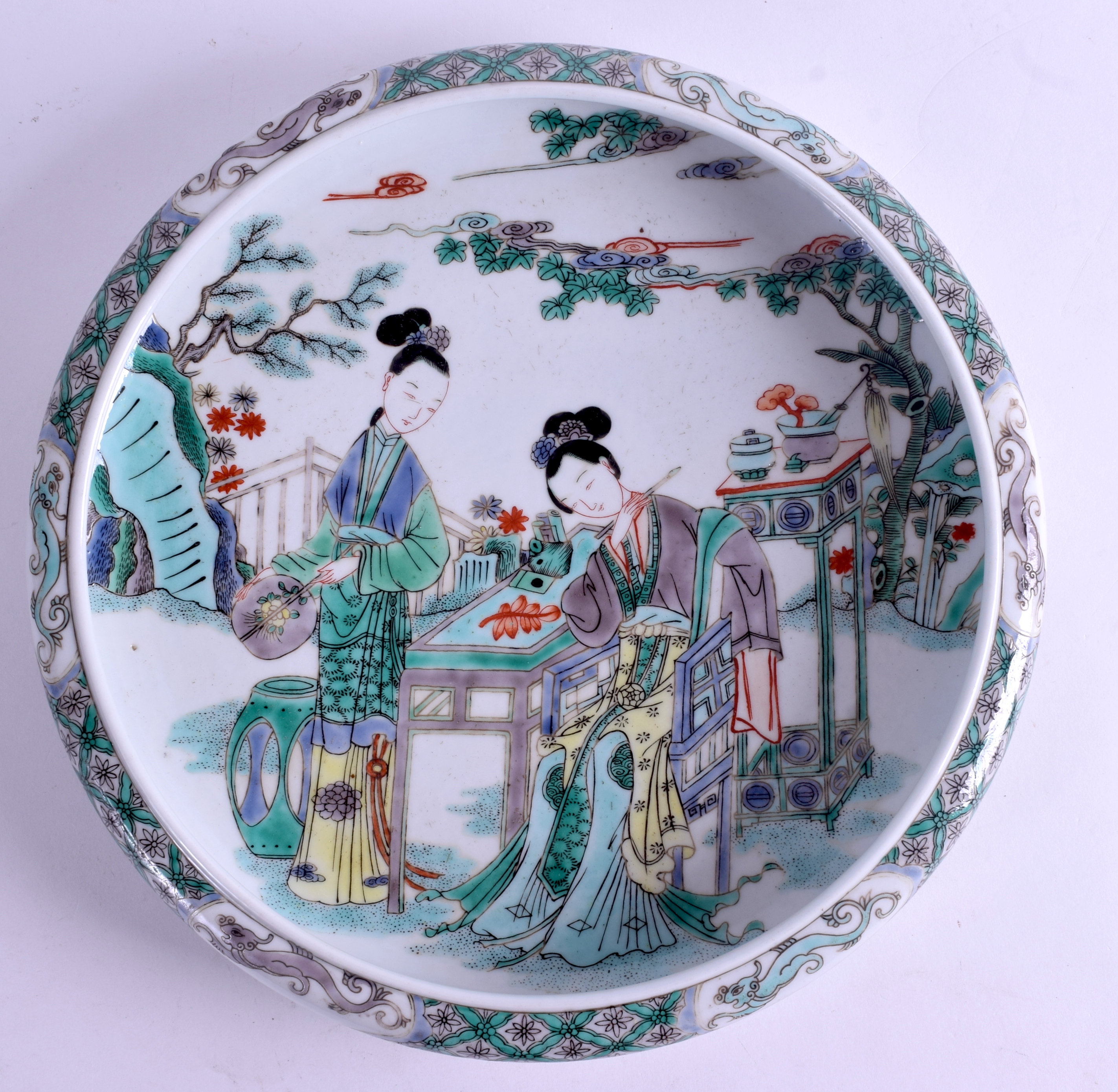 A CHINESE FAMILLE VERTE CIRCULAR SHALLOW BOWL bearing Kangxi marks to base. 25.5 cm wide.