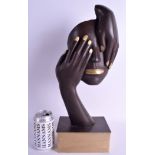 A LARGE CONTEMPORARY BRONZE SCULPTURE OF A MASK encased within hands. 45 cm x 18 cm.