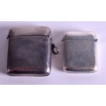 TWO SILVER CASES. (2)