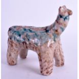 A TURKISH POTTERY FAIENCE FIGURE OF AN ANIMAL. 12 cm wide.