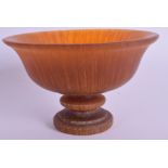 A CHINESE LIBATION CUP. 7 cm x 11 cm.
