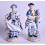 A PAIR OF ANTIQUE MEISSEN FIGURES modelled as a male and female gardener. 20 cm high.