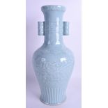 A 19TH CENTURY CHINESE TWIN HANDLED CELADON VASE bearing Qianlong marks to base. 33.5 cm high.