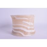 A MIDDLE EASTERN CARVED MARBLE ALABASTER MORTAR. 11 cm x 14 cm.