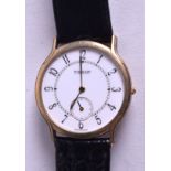 A 9CT GOLD TISSOT WRISTWATCH. 3.5 cm diameter.