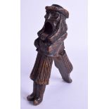 A PAIR OF 19TH CENTURY BAVARIAN CARVED WOOD NUT CRACKERS modelled as an angry male. 21 cm long.