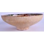 A MIDDLE EASTERN POTTERY BOWL. 24 cm wide.