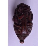 AN 18TH/19TH CENTURY CARVED TREEN COQUILLA NUT SNUFF BOX carved with figures in various pursuits. 7