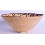 A MIDDLE EASTERN KASHAN POTTERY BOWL. 22.5 cm wide.