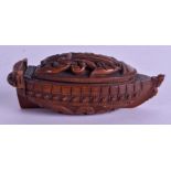 AN 18TH/19TH CENTURY CARVED COQUILLA NUT TREEN SNUFF BOX carved with figures and foliage. 8.5 cm x