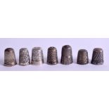 SEVEN SILVER THIMBLES. (7)