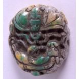 A CHINESE JADEITE TOGGLE. 3.5 cm x 4 cm.