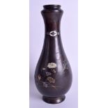 A 19TH CENTURY JAPANESE MEIJI PERIOD BRONZE SILVER AND GOLD VASE enamelled with foliage. 25.5 cm hi