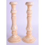 A PAIR OF CONTINENTAL BONE CANDLESTICKS. 20 cm high.