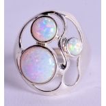 A SILVER AND OPAL RING. Size O.