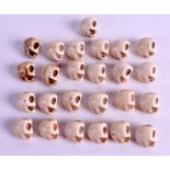 A COLLECTION OF ASIAN STONE SKULLS. (qty)
