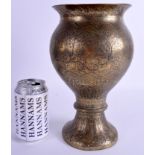 A MIDDLE EASTERN INDAIN BRASS VASE. 27 cm high.