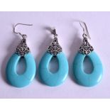 A PAIR OF SILVER AND TURQUOISE EARRINGS.
