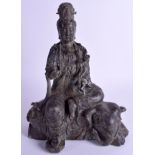 A CHINESE BRONZE FIGURE OF GUANYIN. 30 cm x 20 cm.