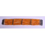 A SILVER AND AMBER BRACELET. 18 cm long.