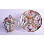 A MID 19TH CENTURY CHINESE CANTON FAMILLE ROSE TWIN HANDLED CUP AND COVER with matching stand. Plat