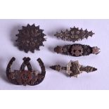 FIVE ANTIQUE SILVER AND GOLD BROOCHES. (5)