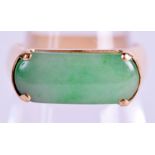 AN 18CT GOLD AND JADEITE RING. Size L.