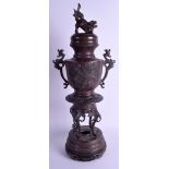 A LARGE JAPANESE MEIJI PERIOD BRONZE VASE AND COVER. 62 cm high. (2)