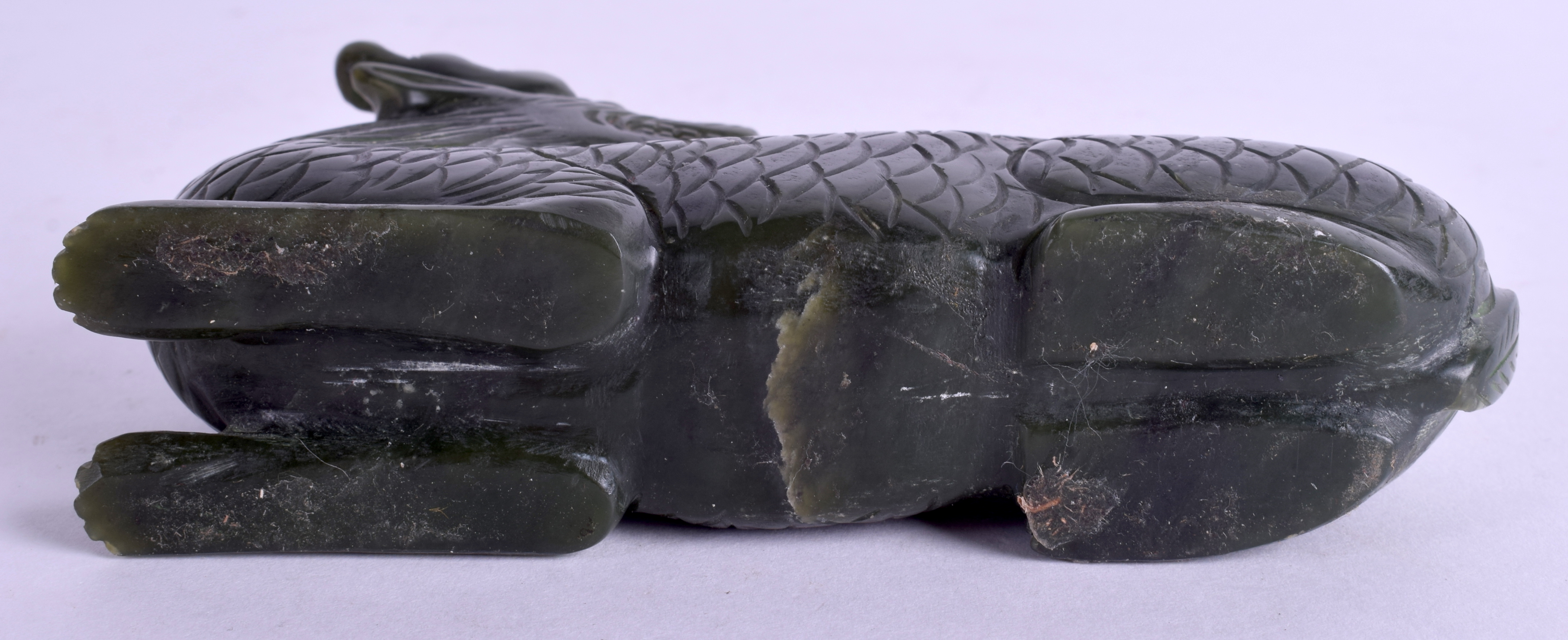 A CHINESE CARVED GREEN HARDSTONE BUDDHISTIC BEAST. 11 cm x 7 cm. - Image 3 of 3