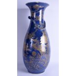 A VERY LARGE 19TH CENTURY CHINESE BLUE GROUND VASE Qing, painted with gilt dragons and phoenix bird