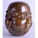 A LARGE CHINESE FOUR SIDED BRONZE HEAD. 21 cm x 10 cm.