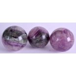 THREE CONTINENTAL FLUORITE BALLS. 6.5 cm wide. (3)