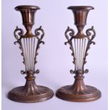 A PAIR OF ANTIQUE OLD SHEFIELD PLATE CANDLESTICKS. 24.5 cm high.