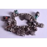 A SILVER CHARM BRACELET with rare guardsman charm. 90 grams.