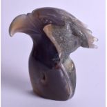 A CARVED AGATE HAWK HEAD. 12 cm x 9 cm.