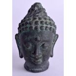 AN ASIAN BRONZE BUDDHA HEAD. 7.5 cm x 4 cm.