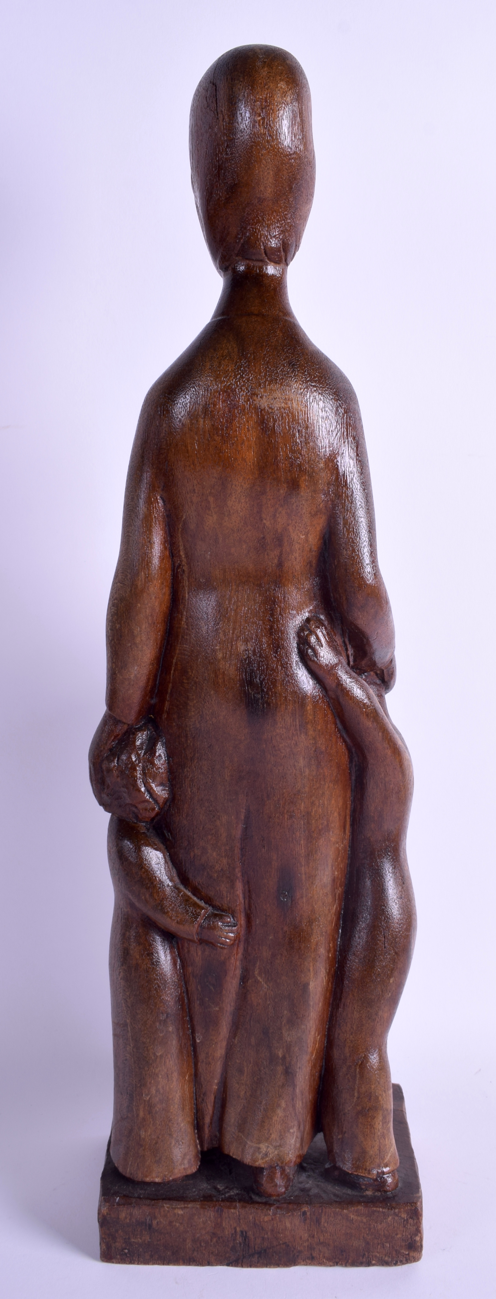 A STYLISH 1950S CARVED EUROPEAN WOOD FIGURE OF A FEMALE possibly Austrian, modelled beside two chil - Image 3 of 8