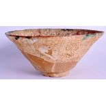 A MIDDLE EASTERN POTTERY BOWL. 24 cm wide.