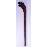 A RARE SAMOAN POLYNESIAN TRIBAL SPIKED WOOD WAR CLUB with zig zag carved handle and barbed rim. 94