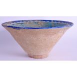 A MIDDLE EASTERN KASHAN POTTERY BOWL. 22.5 cm wide.