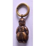 A BRASS BABIES RATTLE. 6 cm long.