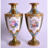 A FINE PAIR OF ROYAL CROWN DERBY JEWELLED PORCELAIN VASES by Desire Leroy, wonderfully executed wit