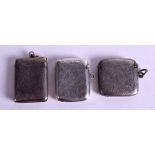 THREE SILVER VESTA CASES. (3)