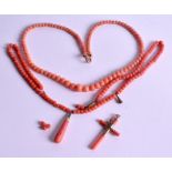 TWO ANTIQUE CORAL NECKLACES and a gold & coral cross. (3)