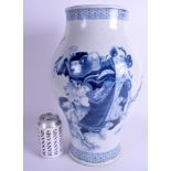 A LARGE CHINESE BLUE AND WHITE VASE bearing Kangxi marks to base, painted with immortals. 39 cm x 2