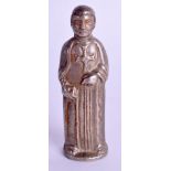 AN ANTIQUE MIDDLE EASTERN SILVER SAINT. 118 grams. 7 cm high.